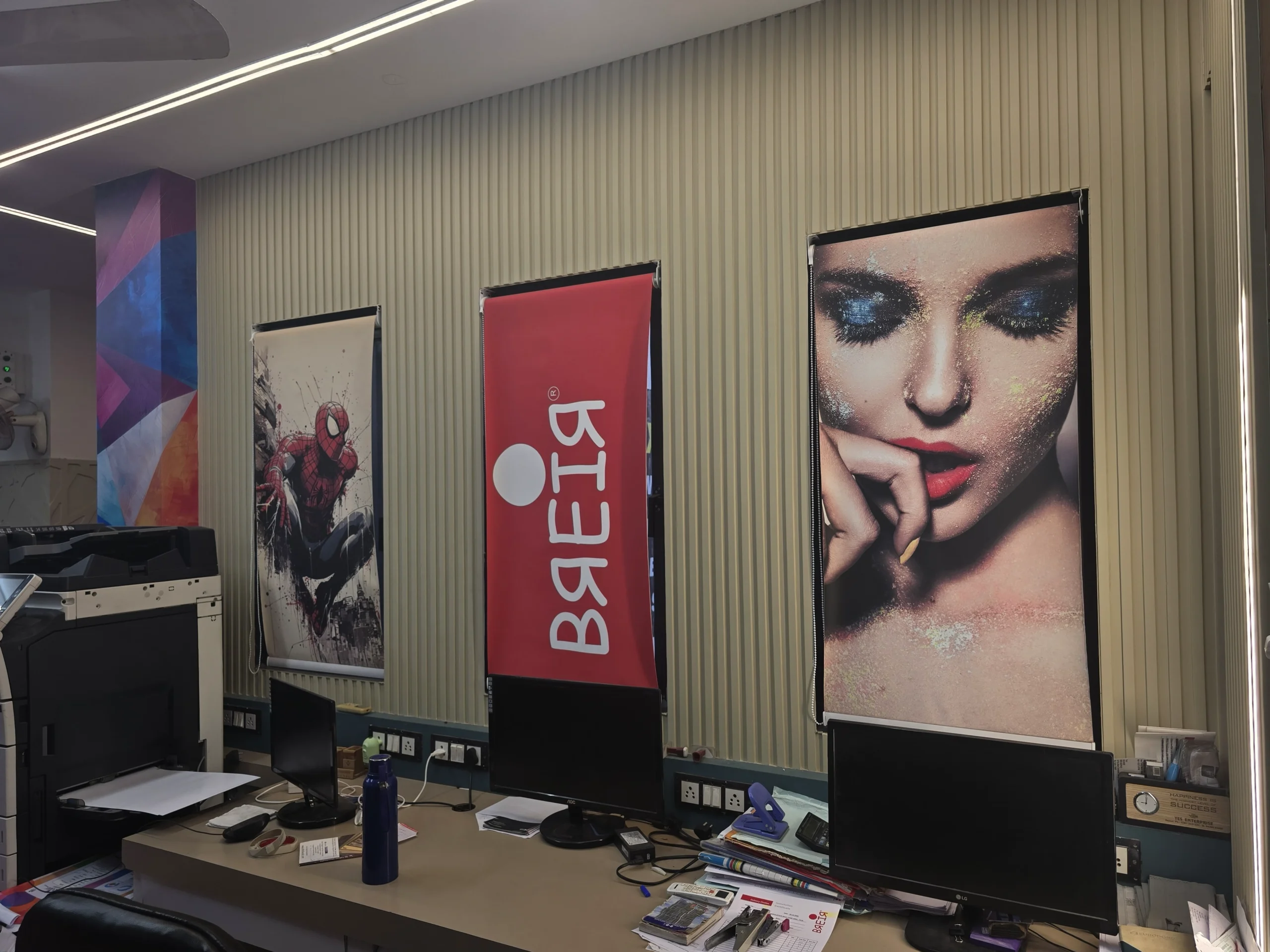 Three custom printed roller blinds in the BREIR office