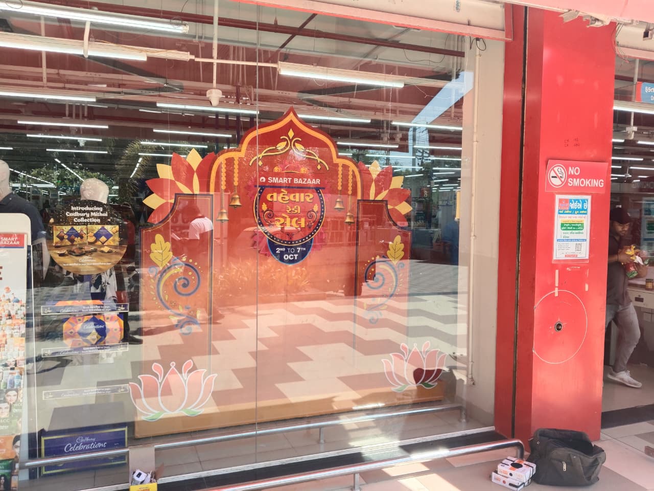 Campaign changeover graphics applied to retail glazing.