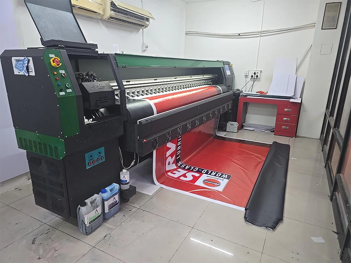 Large-format printer producing commercial banner graphics